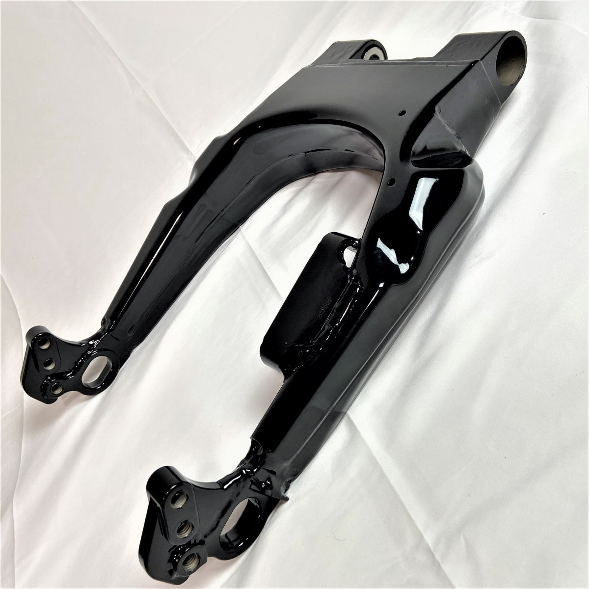GeezerEngineering Modified 2009-up OEM Swing Arm for Harley